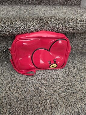 BT21 Tata Enamel Cosmetic Bag featuring the heart-shaped character Tata